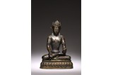 A LARGE COPPER ALLOY FIGURE OF SEATED BUDDHA