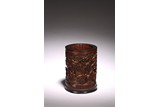 A CHINESE BAMBOO SIGNED RELIEF CARVED BRUSHPOT