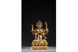 A GILT BRONZE FIGURE OF BODHISATTVA