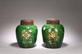 A PAIR OF CHINESE SANCAI RELIEF FLORAL JARS