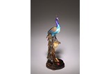 A CHINESE SILVER ENAMEL PEACOCK