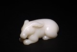 A CHINESE WHITE JADE CARVED RABBIT