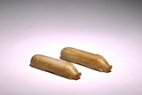 A PAIR OF JADE CARVED RECUMBENT PIGS