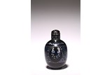 A CHINESE BLACK LACQUER MOTHER OF PEARL SNUFF BOTTLE
