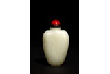 A CHINESE WHITE JADE 'SCHOLAR' SNUFF BOTTLE