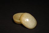 A CELADON JADE OVAL SHAPED BOX AND COVER
