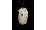 A CHINESE WHITE JADE 'CHILONG' PENDANT