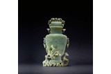 A SPINACH JADE CARVED 'DEER AND PLUM' VASE