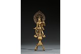 A GILT BRONZE FIGURE OF AVALOKITESHVARA BUDDHA