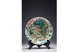 A CHINESE FAMILLE VERTE DRAGON DISH