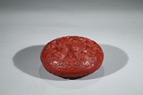 CINNABAR LACQUER STYLE 'BUDDHIST LIONS' BOX AND COVER