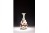 A WHITE AND RED GLAZED DRAGON VASE 