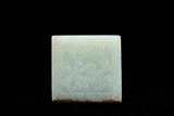 A CHINESE WHITE JADE 'CHILONG' SQUARE PLAQUE