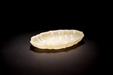A CHINESE WHITE JADE LOBED DISH