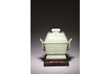 A CELADON JADE ARCHAISTIC 'TAOTIE' CENSER WITH COVER