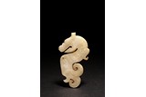 A CHINESE WHITE JADE DRAGON PLAQUE