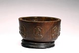 A CHINESE AGARWOOD CARVED 'BUDDHIST' BOWL