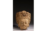 A LARGE STONE CARVED BUDDHA HEAD
