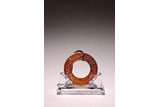 A CHINESE REDDISH BROWN JADE DISC BI