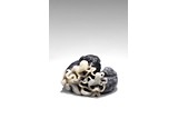 A BLACK AND WHITE JADE 'MYTHICAL BEASTS' GROUP
