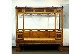 A CHINESE WOOD CARVED SIX POST CANOPY BED