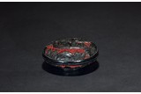 A BLACK AND CINNABAR LACQUER FIGURES PASTE BOX