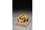 A SOAPSTONE CARVED 'MYTHICAL BEASTS' SQUARE SEAL
