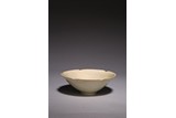 A CHINESE YAOZHOU CELADON CONICAL BOWL
