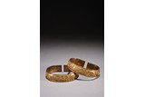 A PAIR OF GILT BRONZE 'MANCHU SCRIPT' BANGLES