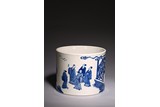 A BLUE AND WHITE 'NINE SCHOLARS' BRUSHPOT