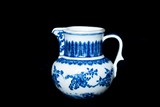 A CHINESE BLUE AND WHITE GLOBULAR TANKARD 