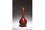 A CHINESE RED GLAZED BOTTLE VASE