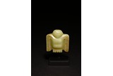 A CHINESE ARCHAIC GREEN JADE 'BIRD' PENDANT