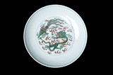 A CHINESE DOUCAI 'DRAGON AND PHOENIX' DISH