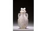 A CHINESE LAVENDER JADEITE 'FIGURES' VASE AND COVER