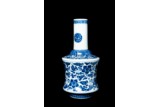 A CHINESE BLUE AND WHITE 'LOTUS SCROLLS' VASE