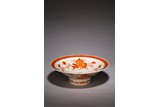 AN IRON RED ENAMEL 'POMEGRANATES' DISH 