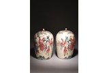 A PAIR OF FAMILLE ROSE 'BOYS' JARS AND COVERS