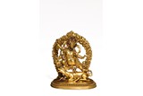 AN EXQUISITE GILT BRONZE FIGURE OF YAMANTAKA
