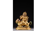 A GILT BRONZE FIGURE OF VAISRAVANA