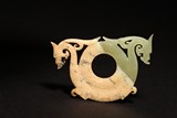 A CHINESE ARCHAISTIC JADE DISC