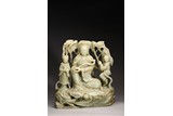 A LARGE CELADON JADE 'RUYI GUANYIN' FIGURAL GROUP