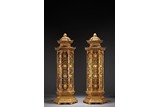 A PAIR OF GILT BRONZE RETICULATED PAGODA-FORMED INCENSE HOLDERS