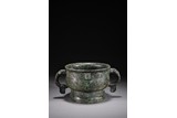 A CHINESE ARCHAISTIC INSCRIBED BRONZE GUI VESSEL