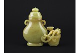 A YELLOW JADE CARVED 'CHILONG' JOINED VESSEL