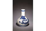 A CHINESE BLUE AND WHITE DRAGON VASE