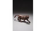 A BRONZE CAST TIGER 