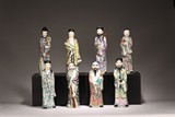 A SET OF EIGHT CHINESE FAMILLE ROSE IMMORTAL FIGURES