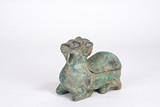 A CHINESE BRONZE RAM-FORM LAMP