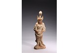 A POTTERY FIGURE OF STANDING GUARDIAN KING